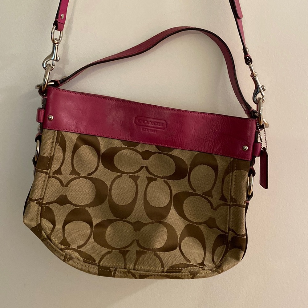 Coach leather and C design purse.   Includes both short and long straps.
